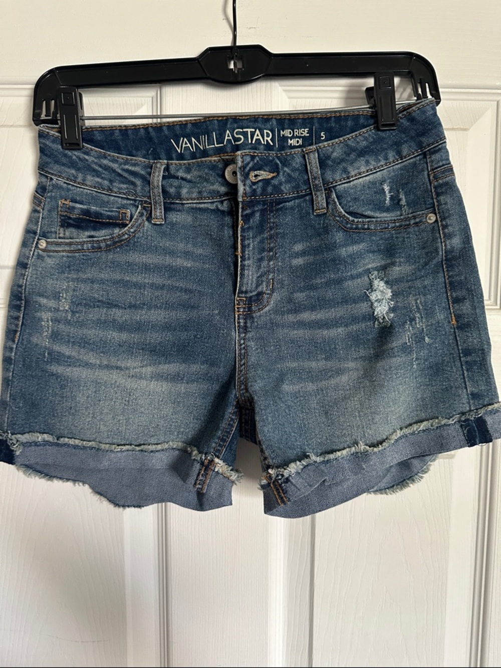 Vanilla Star Distressed Mid-Rise Denim Shorts in Blue
